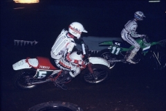 The TT about to suck the goggles off Jason Buckley on a KX250